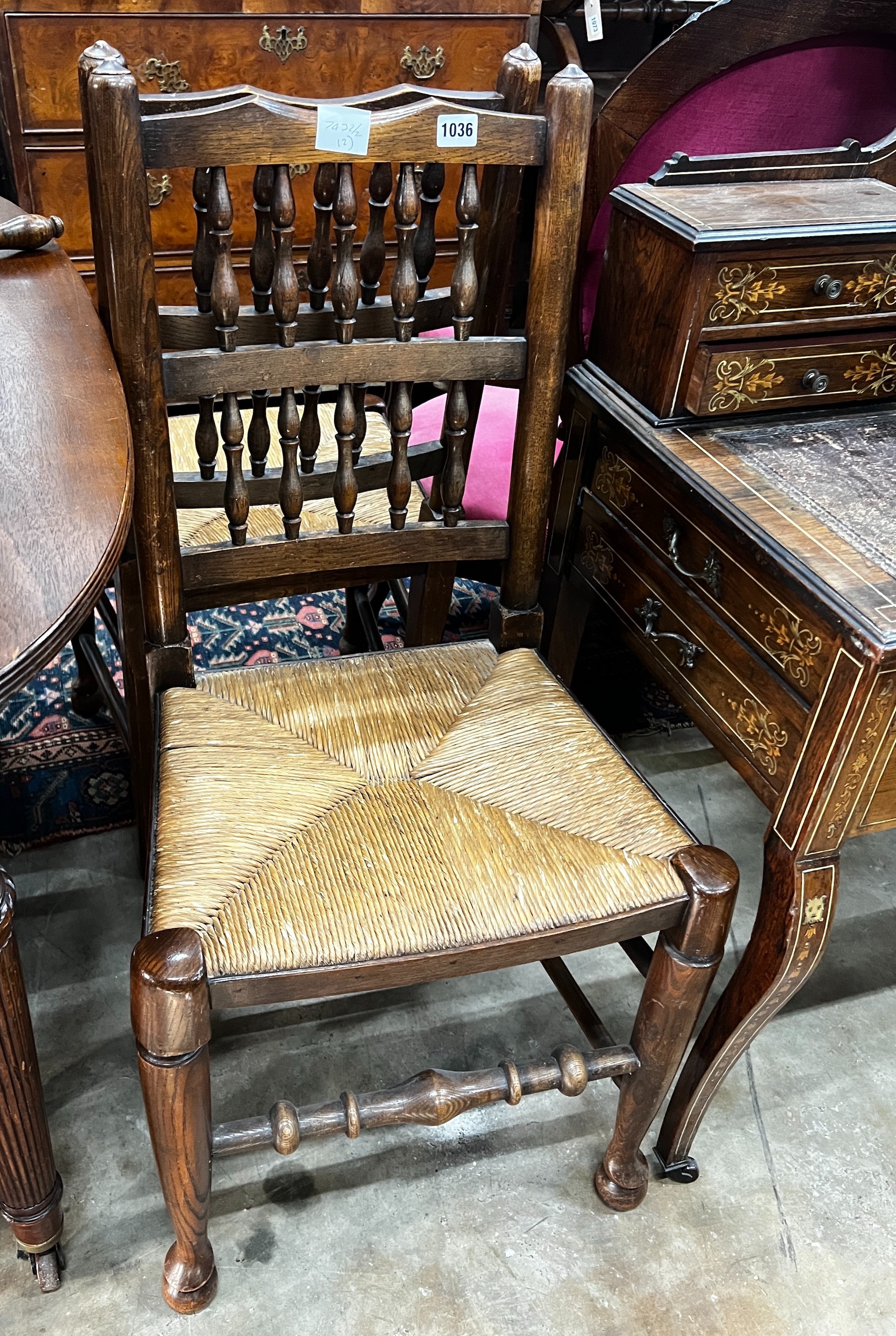 A pair of Lancashire elm and beech rush seat chairs